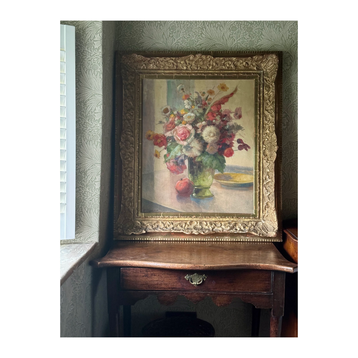 FLOWERS IN A GREEN VASE