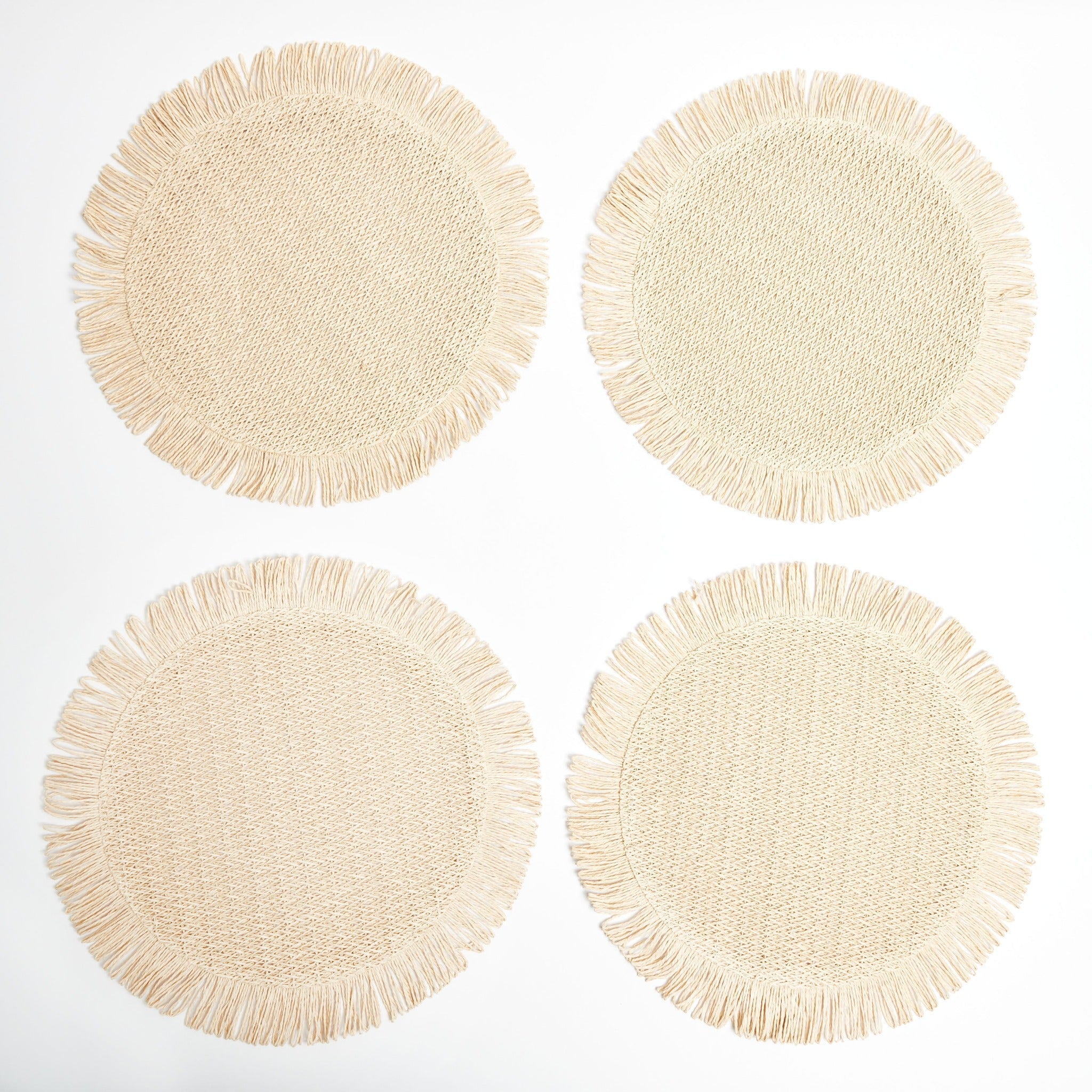 Elia Woven Rattan Round Fringed Placemats (Set of 4)