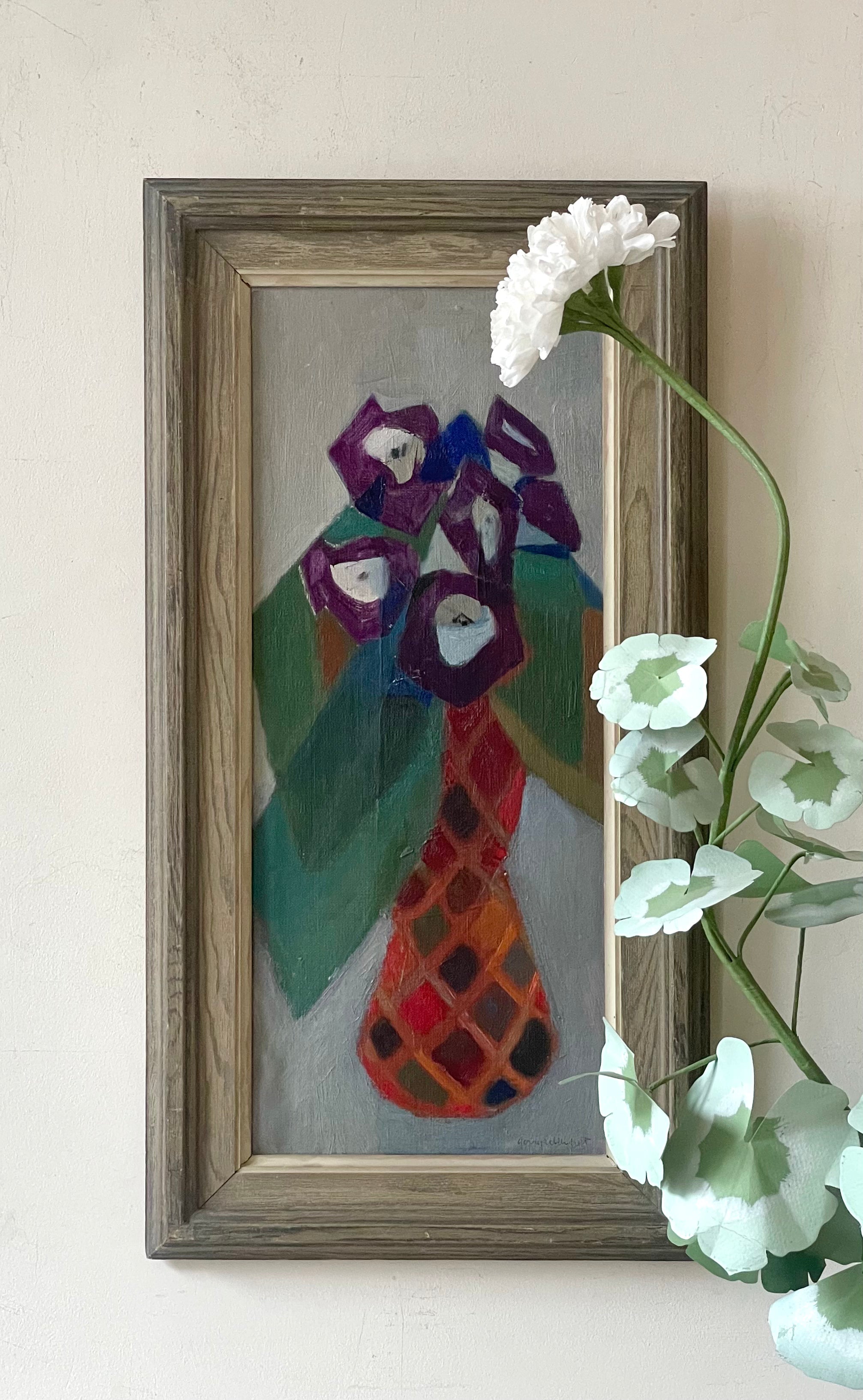 Purple Flowers in Mosaic Vase