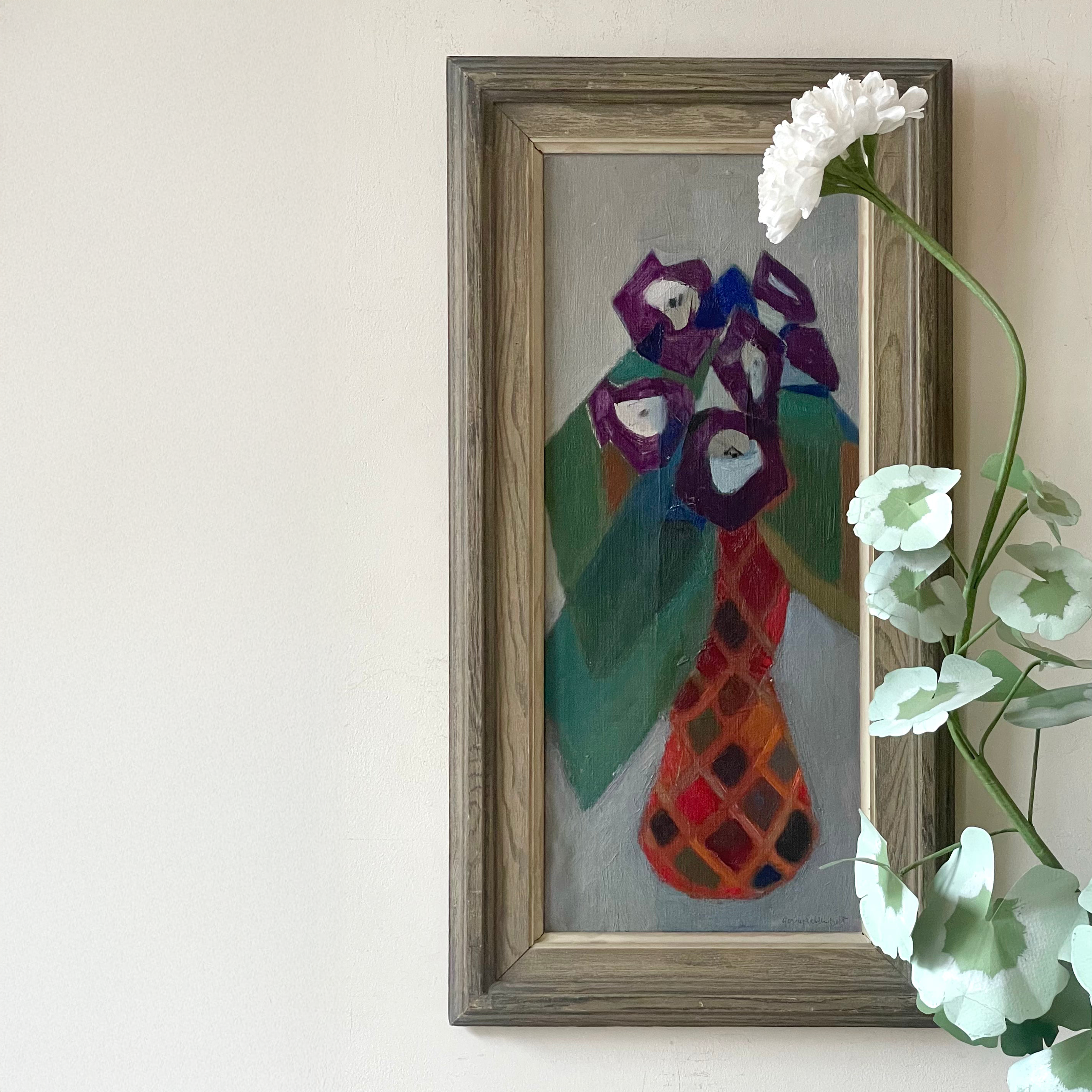 Purple Flowers in Mosaic Vase