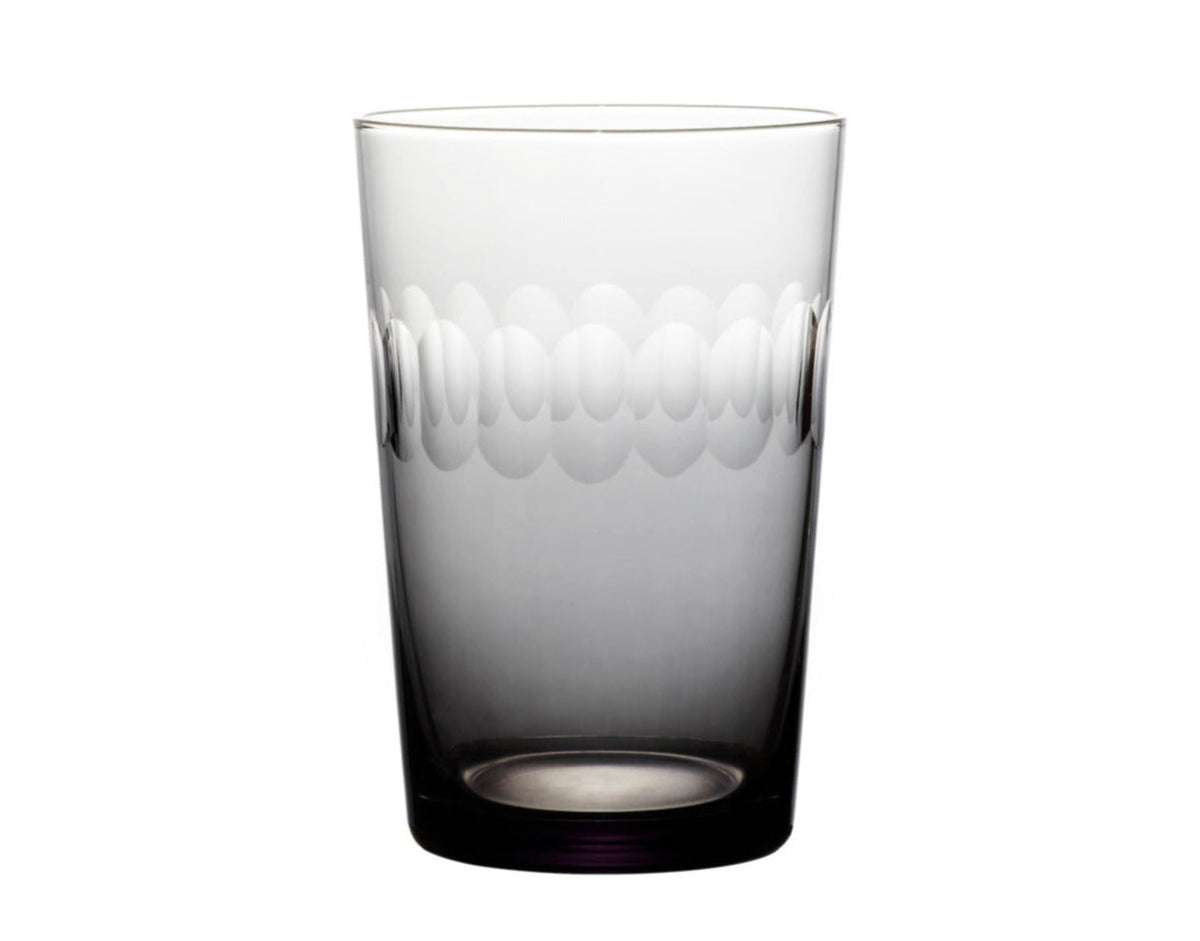 four smoky crystal tumblers with lens design