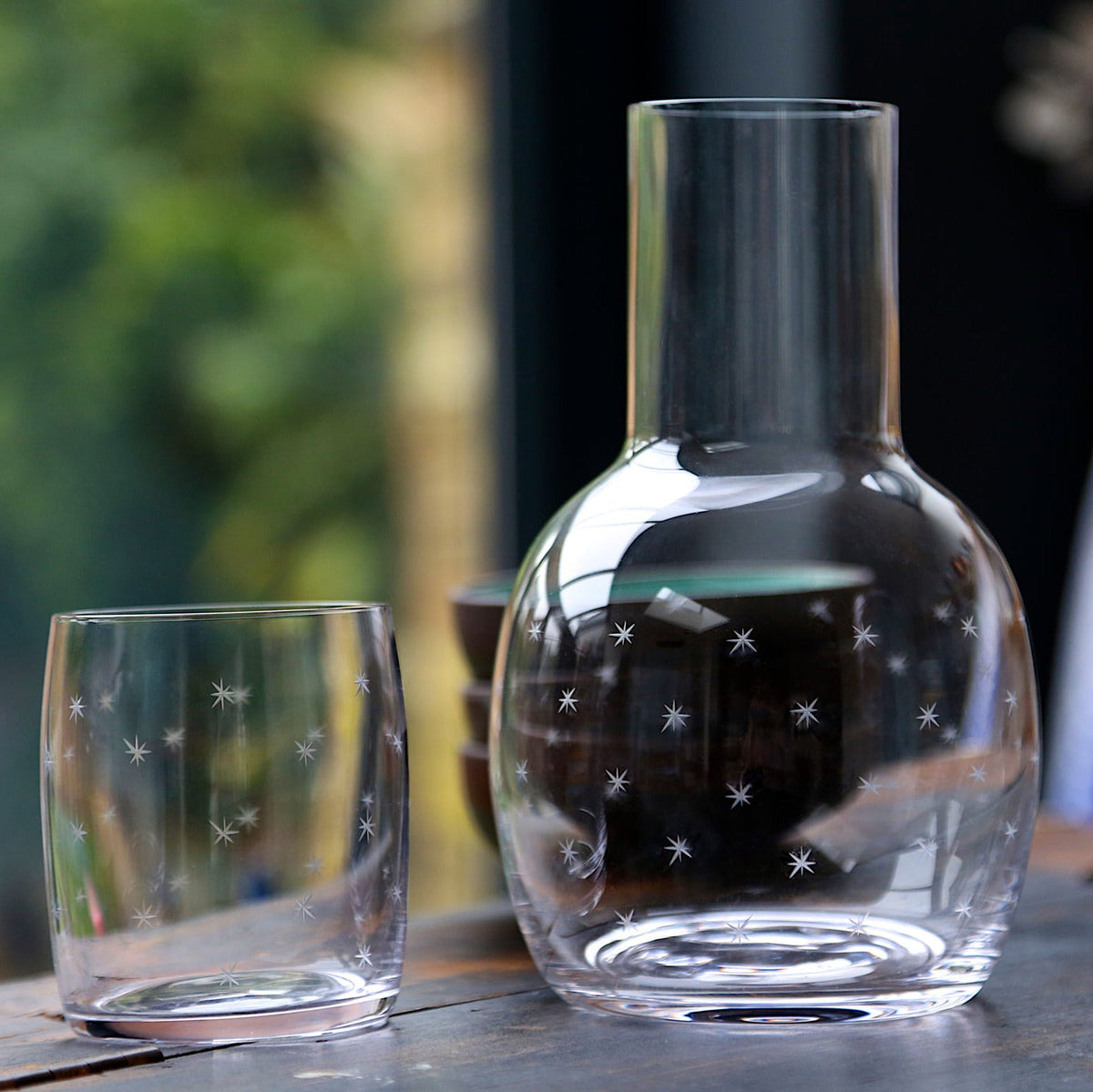 A Crystal Carafe Set with Stars Design