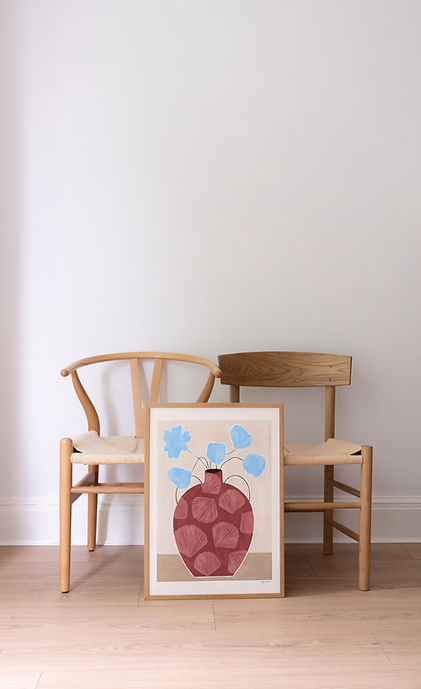 Blue Flowers In Shell Vase