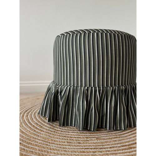 Trendel ottoman with frill slipcover