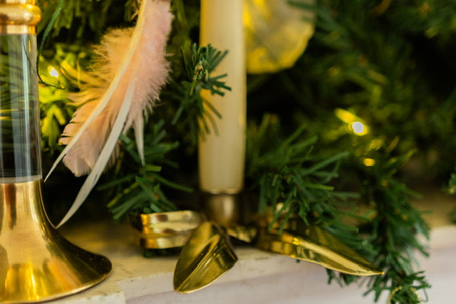 A Pair of Bow Candleholders | Brass