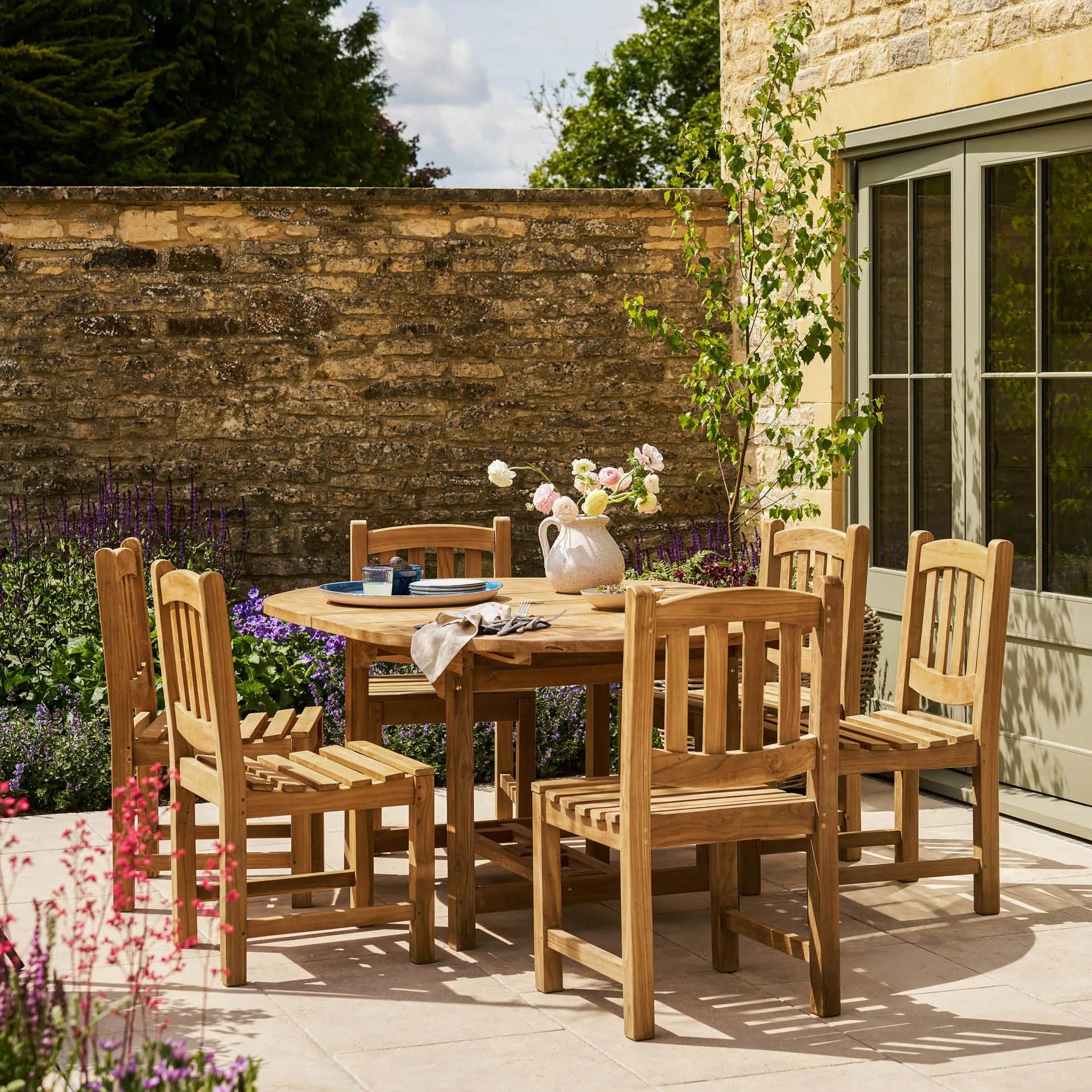 Avon Teak Oval Extending Dining Table