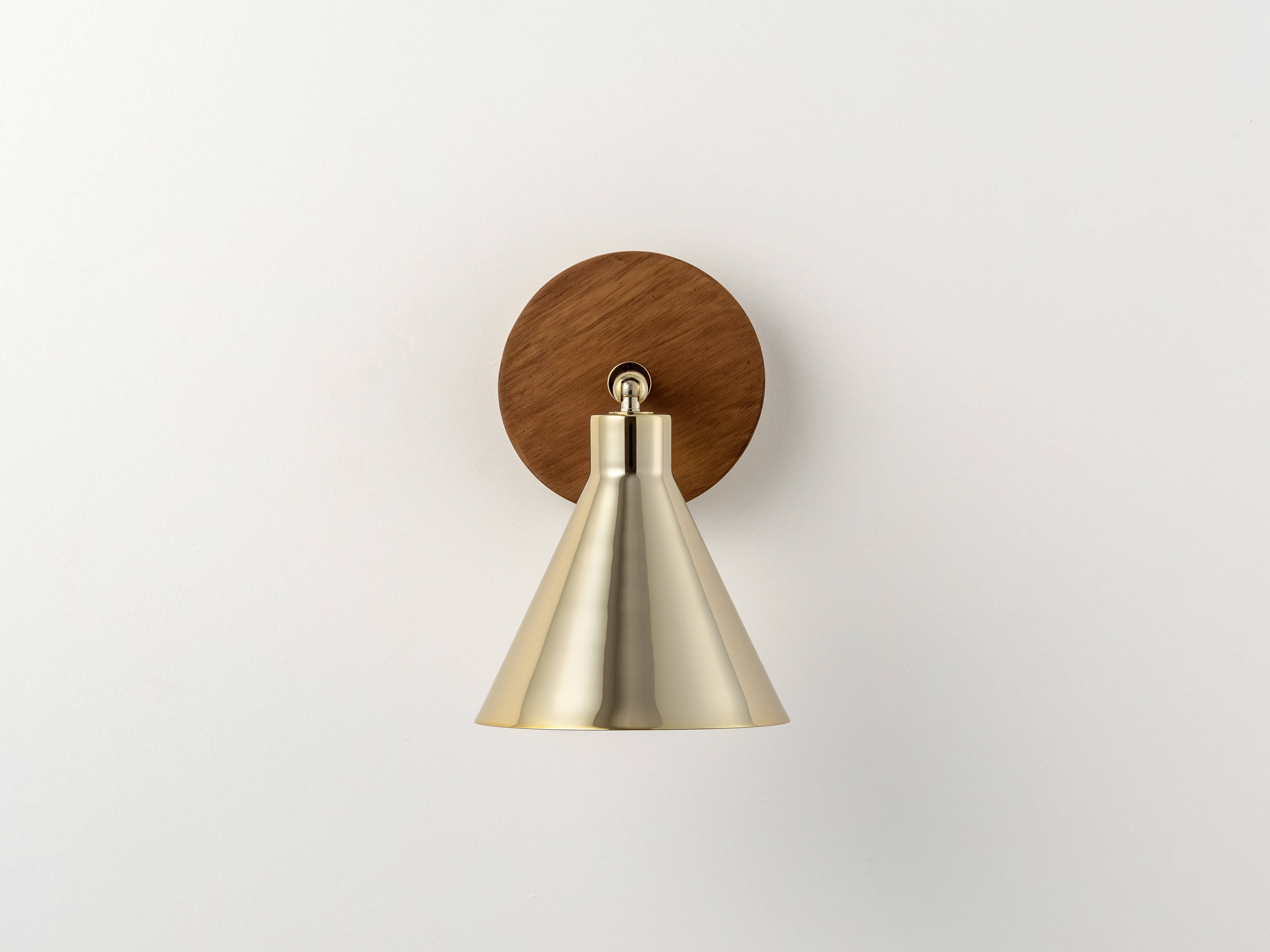 Brass cone wall light