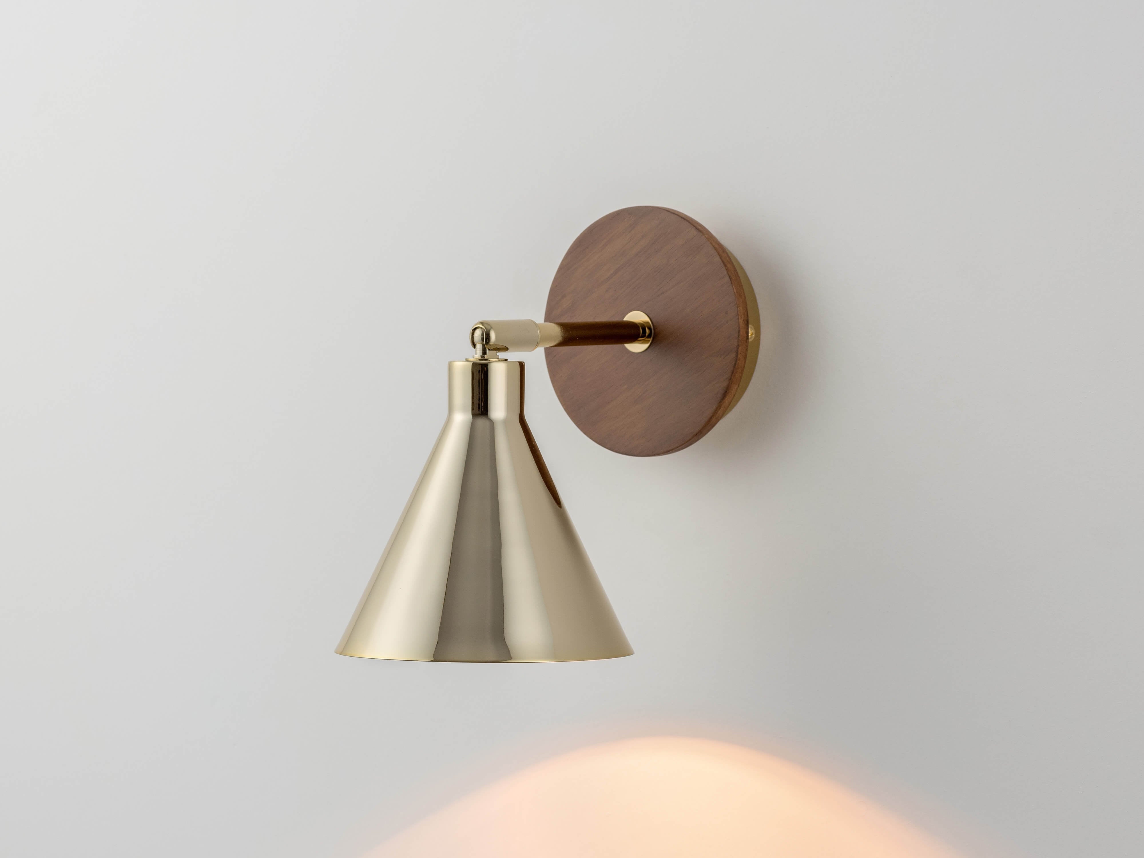 Brass cone wall light