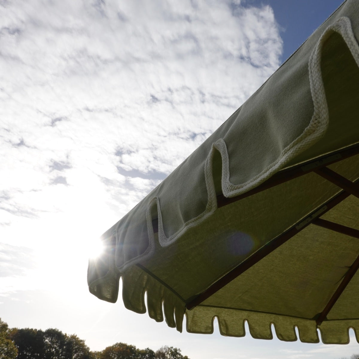 Light green castellated parasol