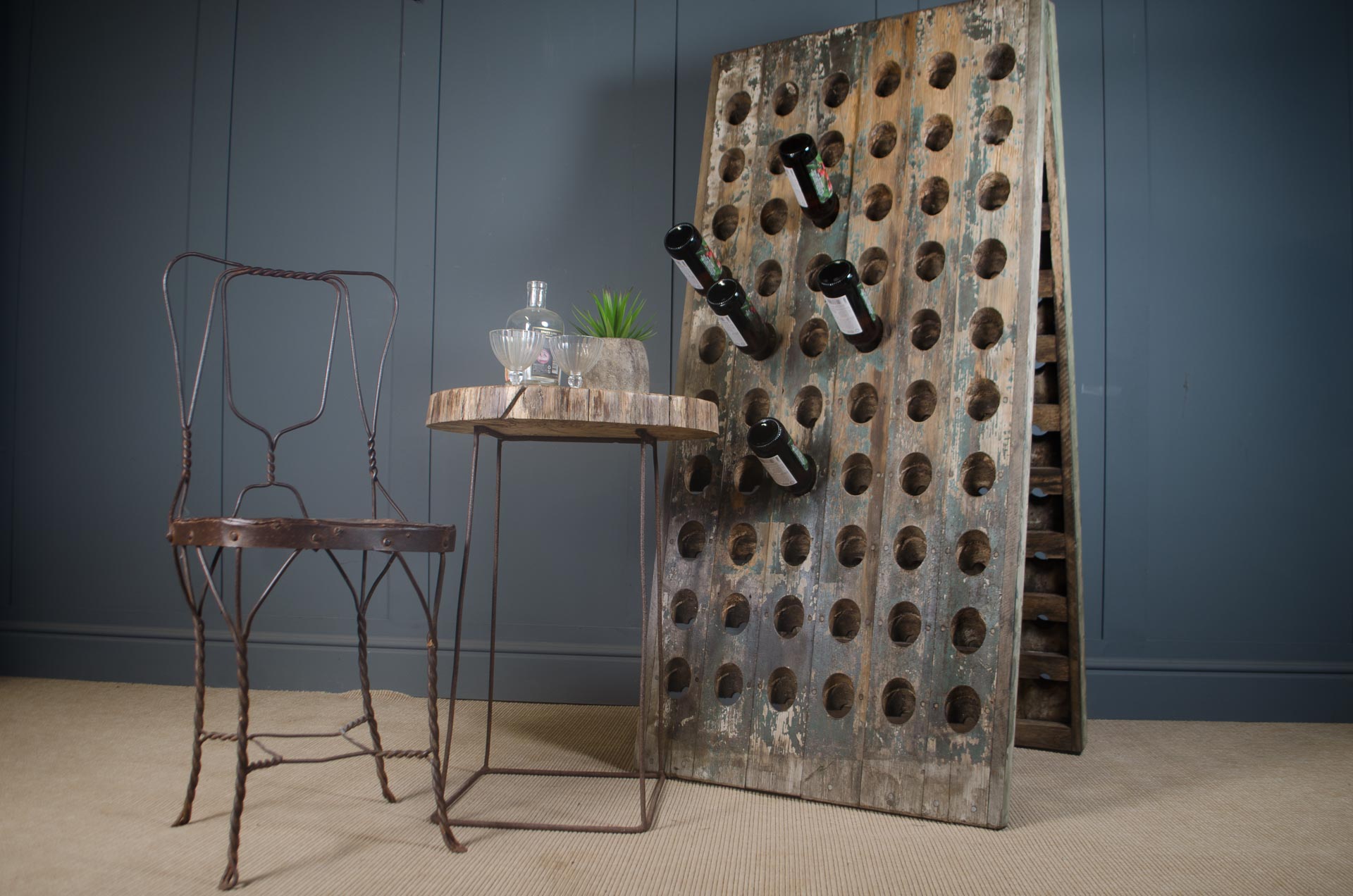 Reclaimed wine bottle riddler stands