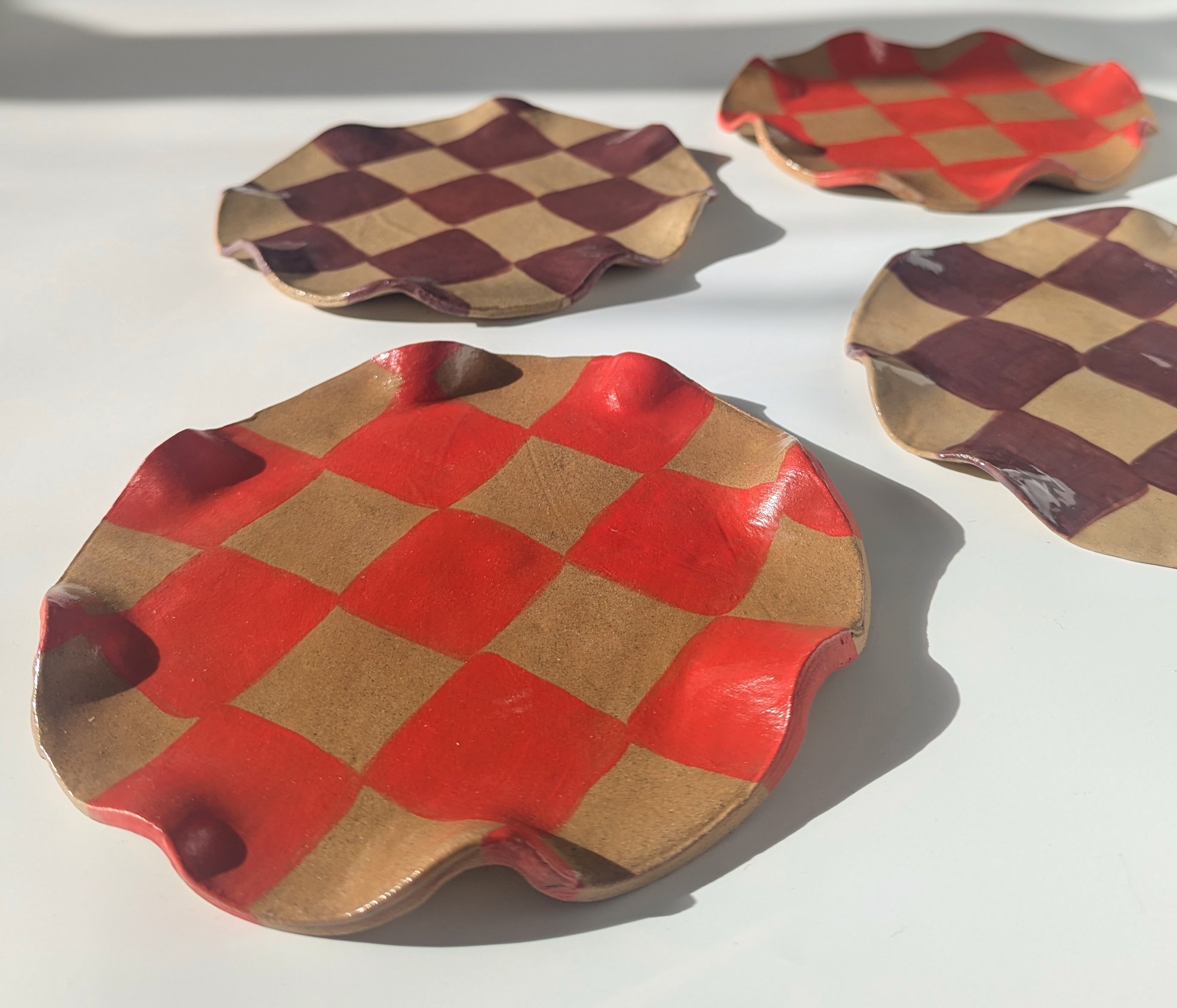 Set of Four Red & Burgundy Wavy Check Side Plates