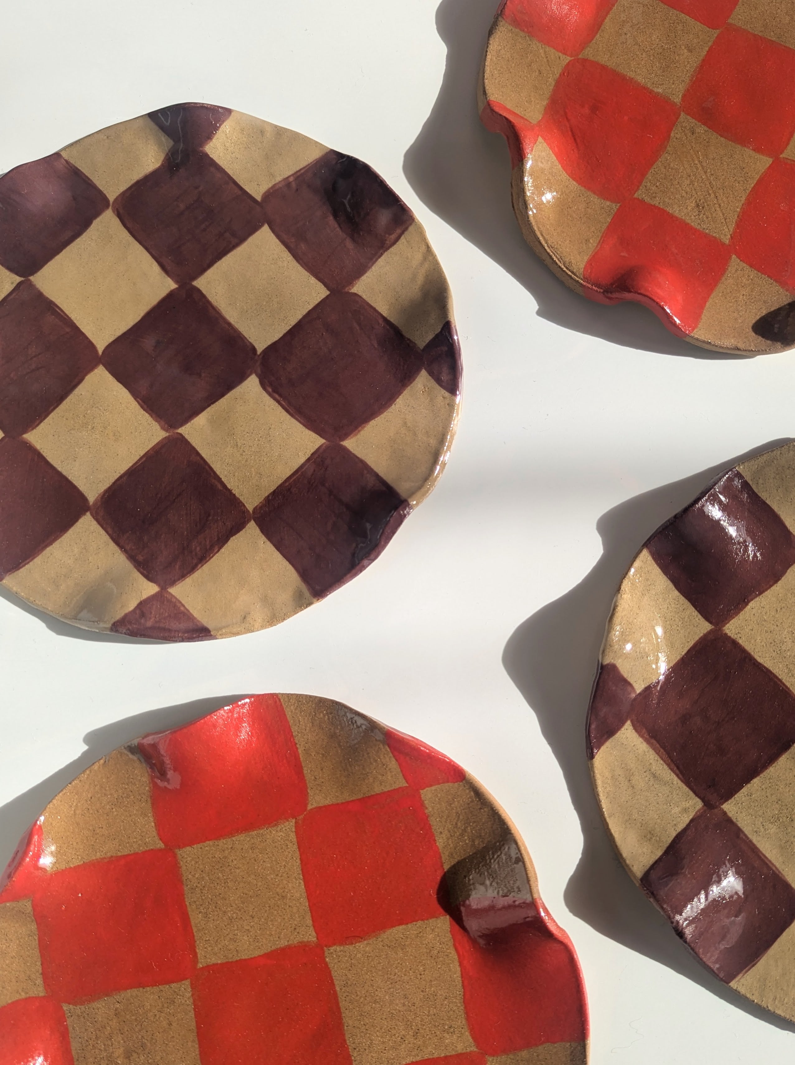 Set of Four Red & Burgundy Wavy Check Side Plates