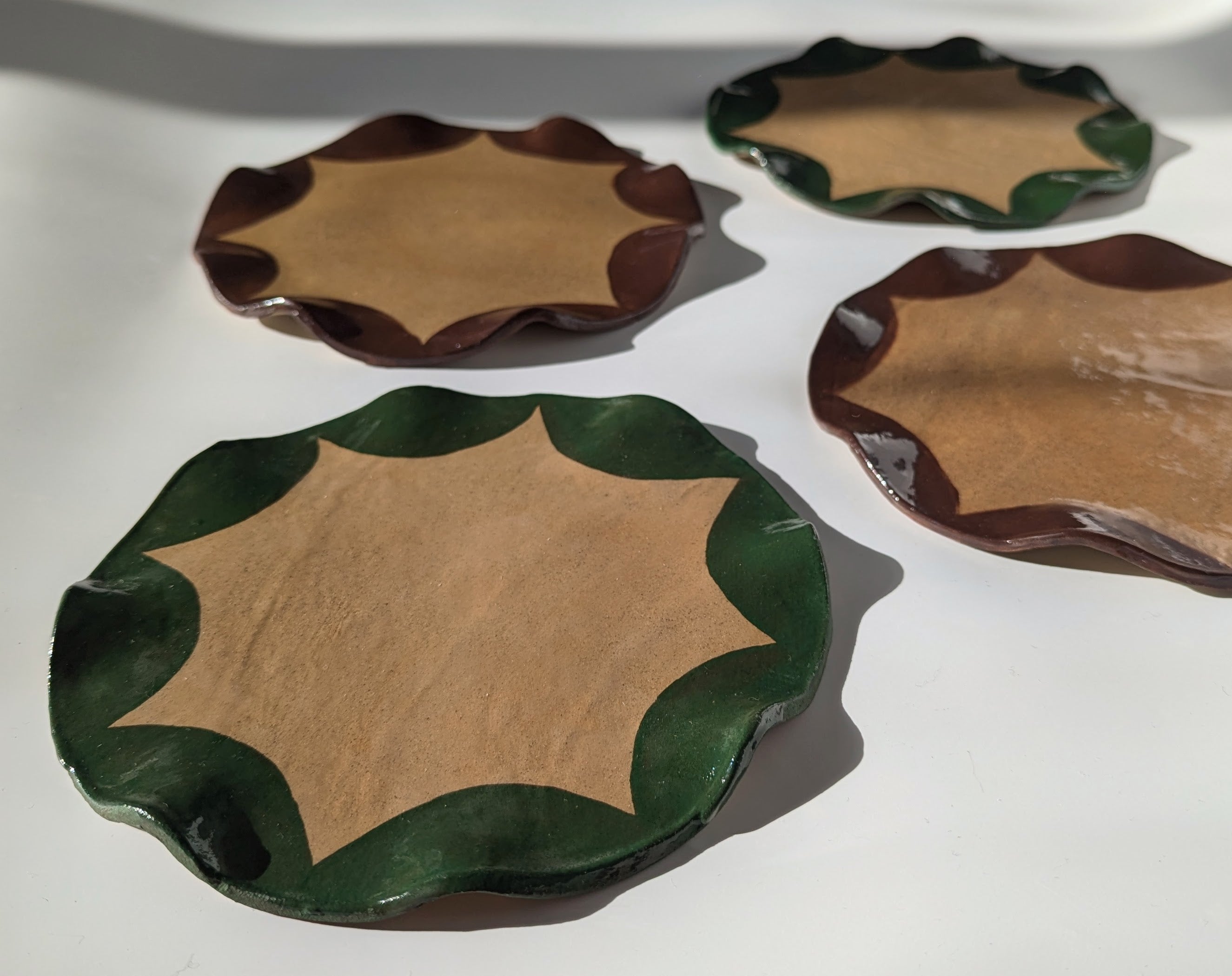 Set of Four Green & Brown Wavy Scalloped Side Plates