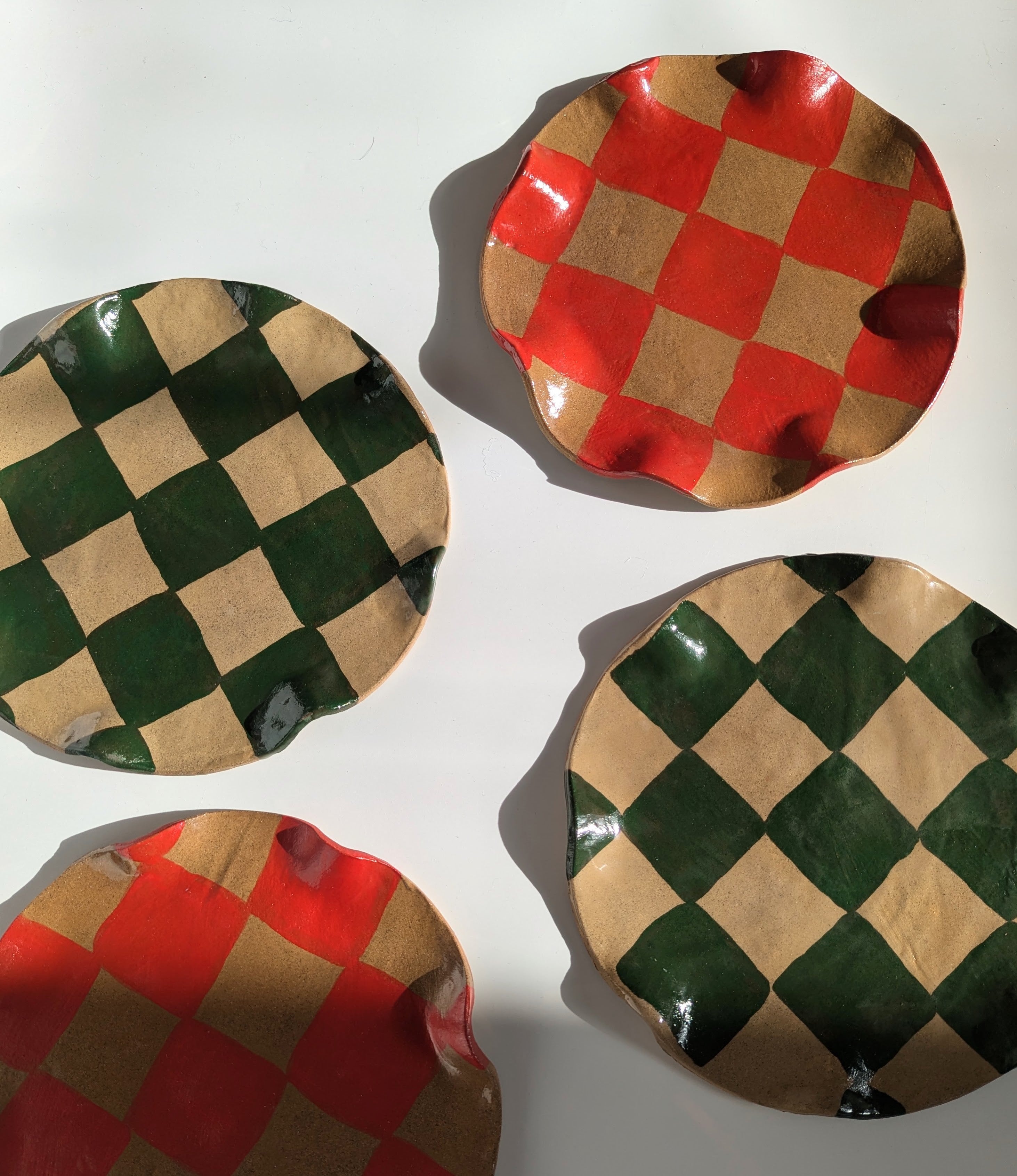 Set of Four Green & Red Wavy Check Side Plates