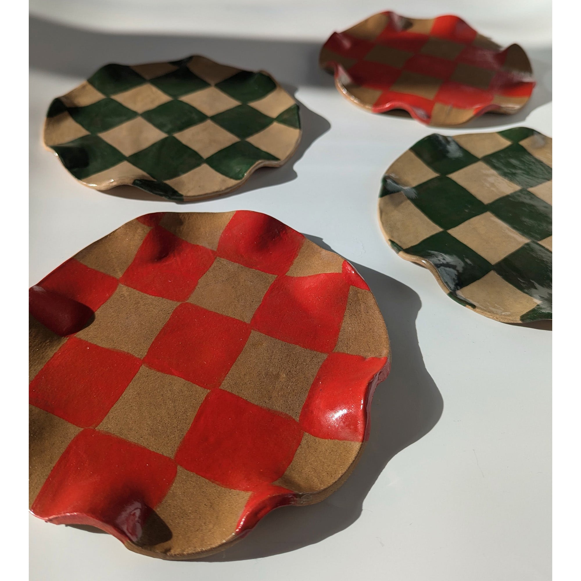 Set of Four Green & Red Wavy Check Side Plates