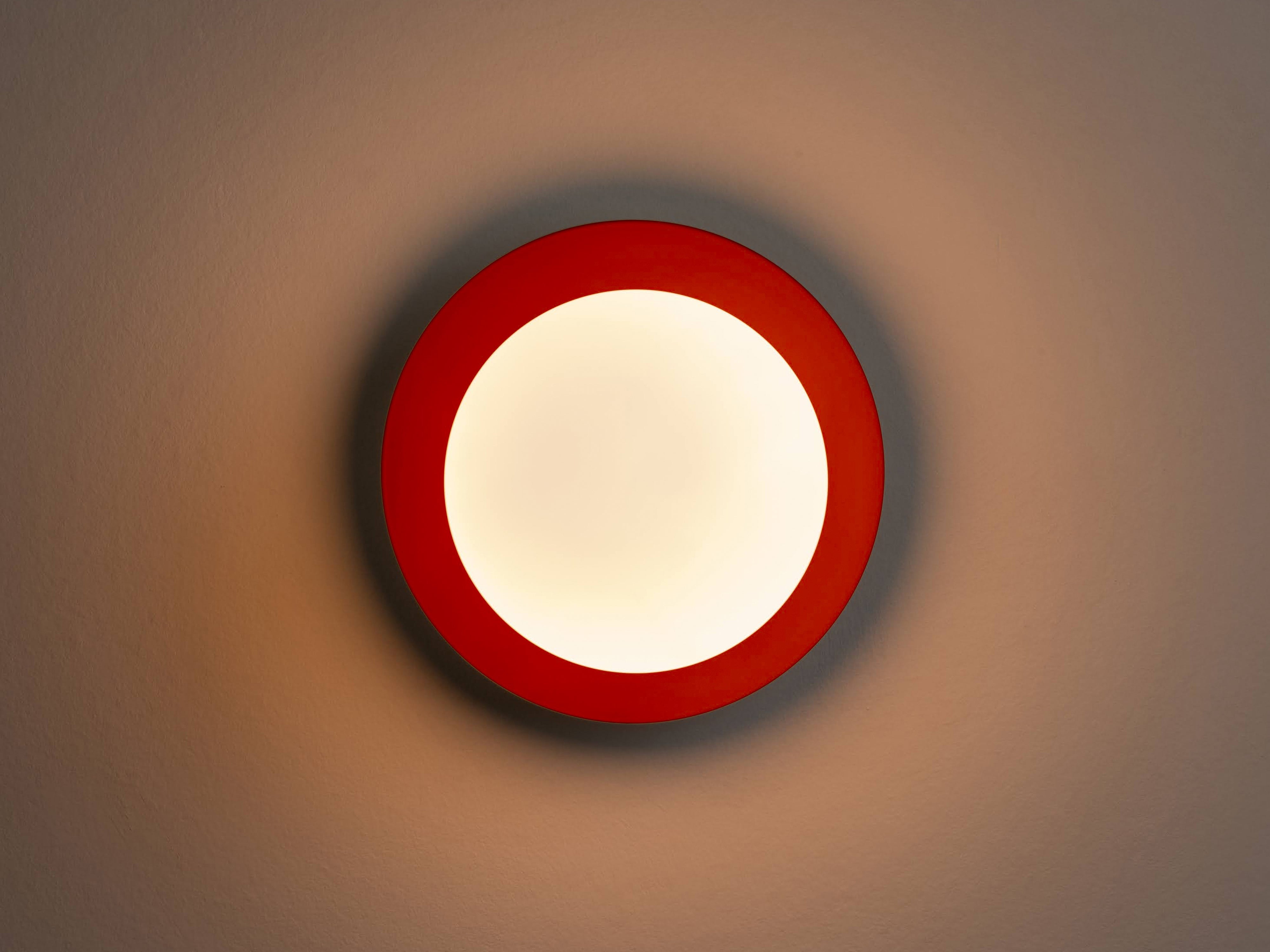 Peel orange opal disk wall light