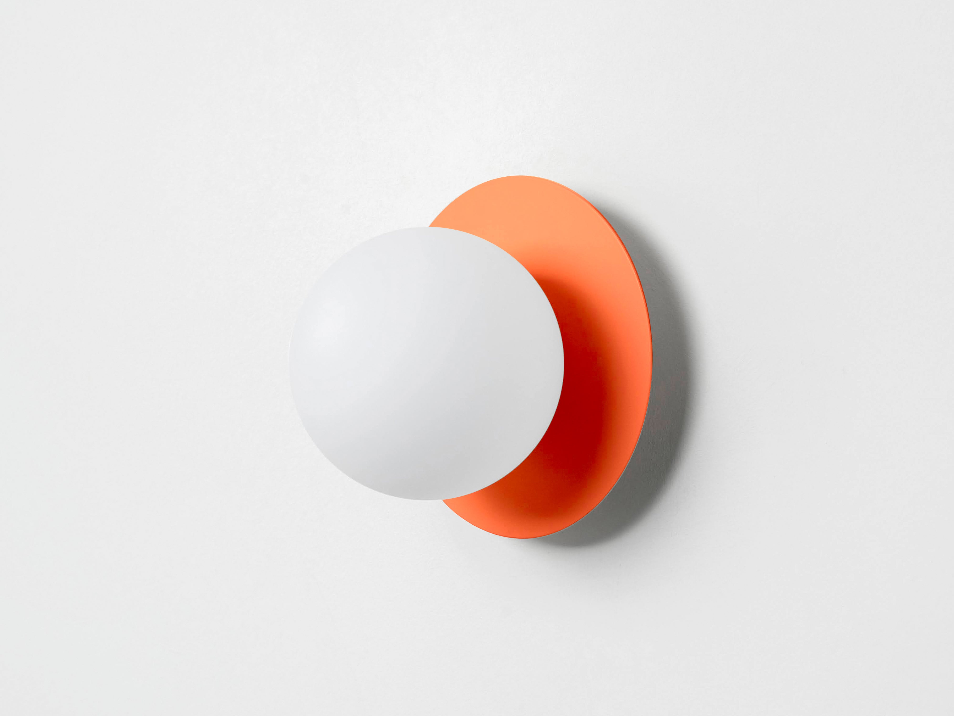 Peel orange opal disk wall light