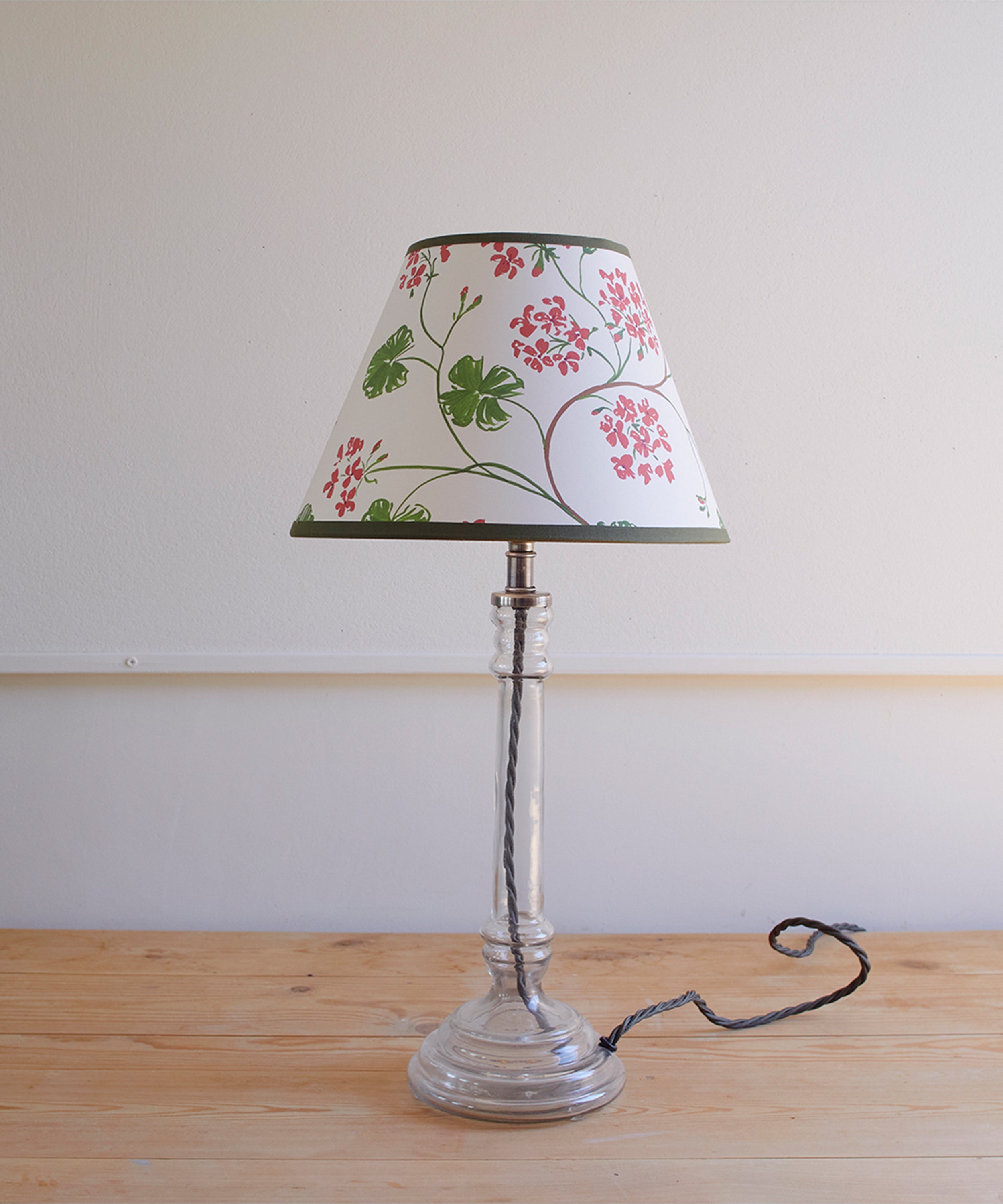 Geraniums, paper lampshade, empire