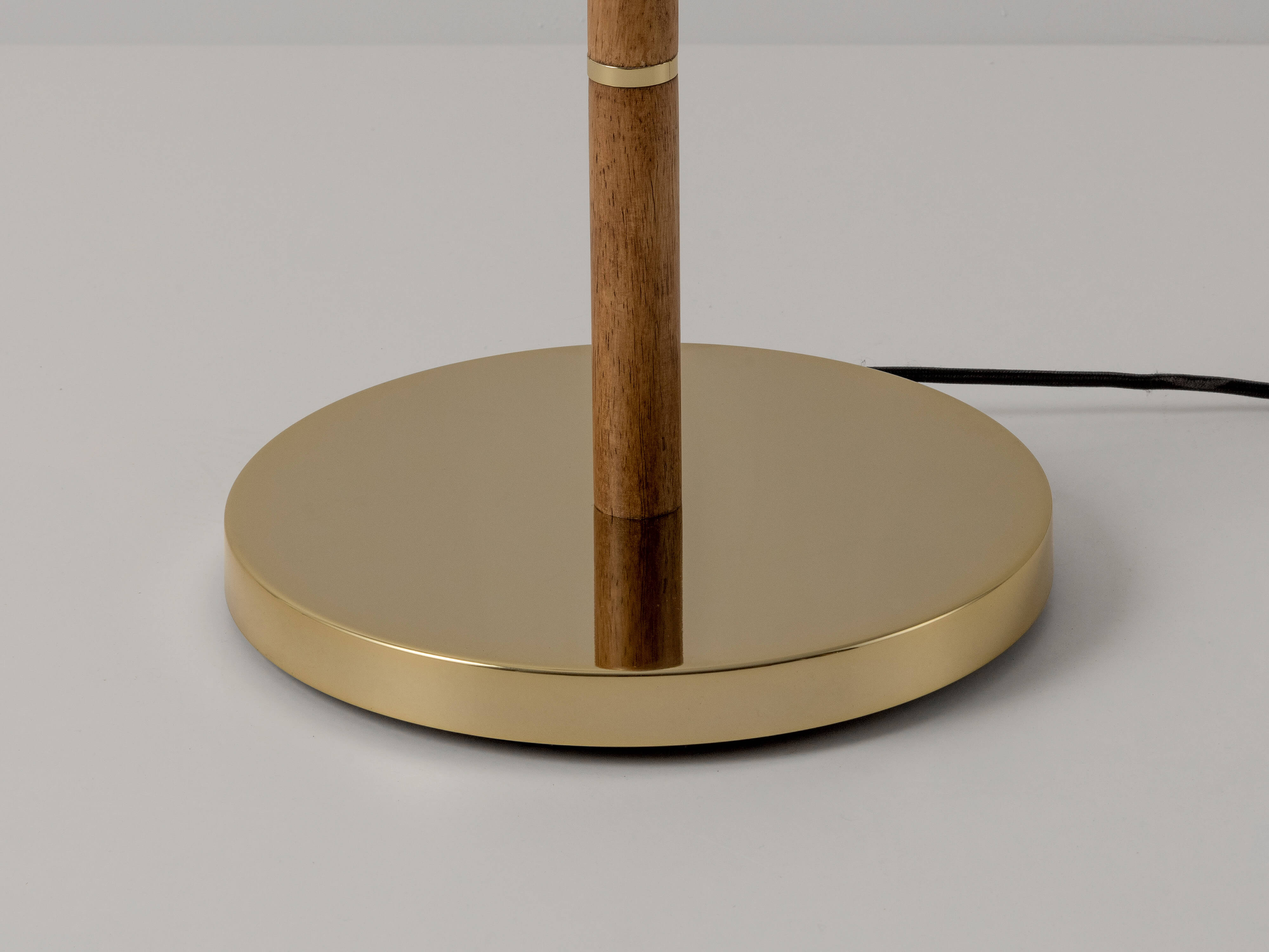 Wooden and brass disk floor lamp