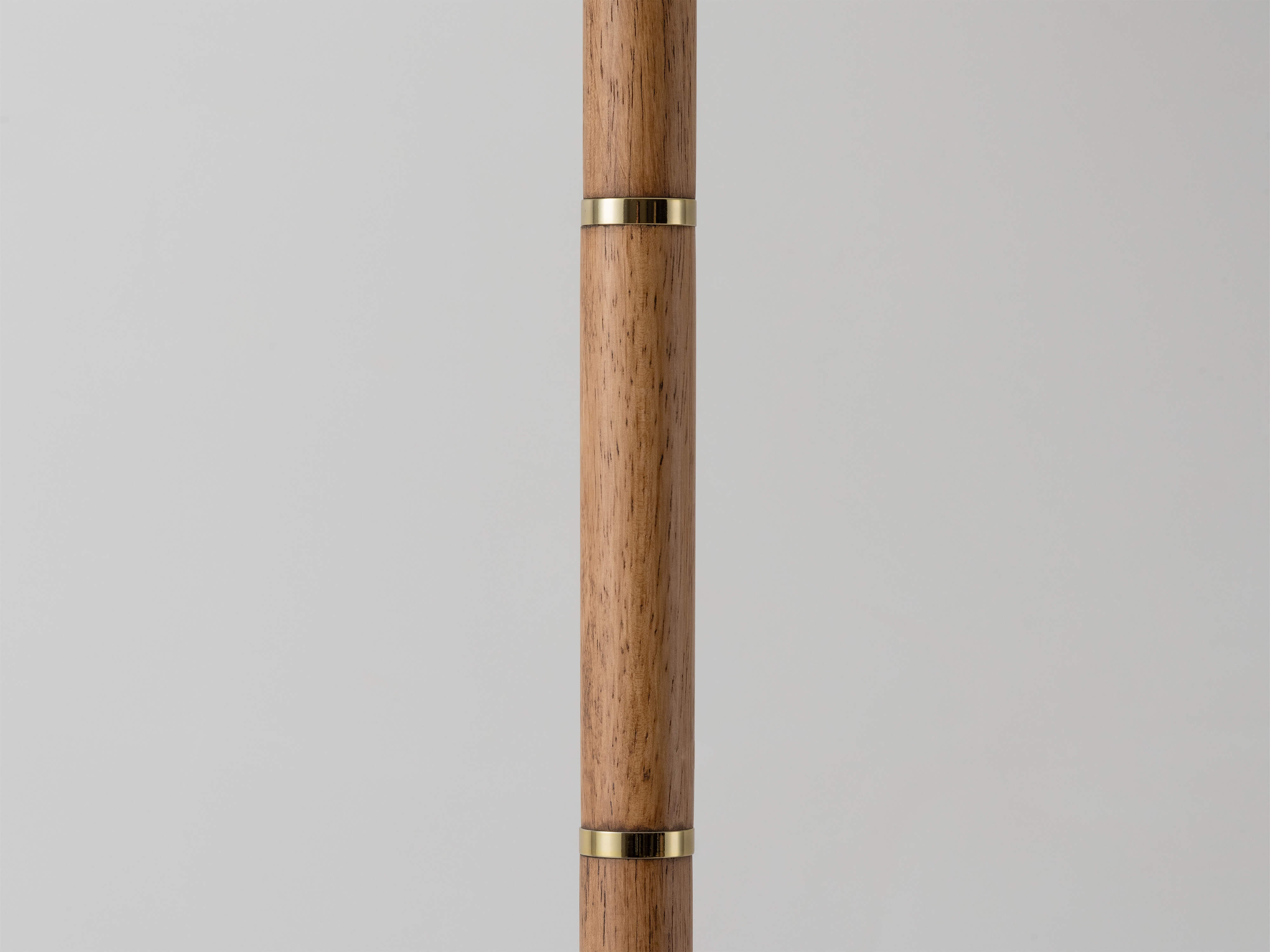 Wooden and brass disk floor lamp