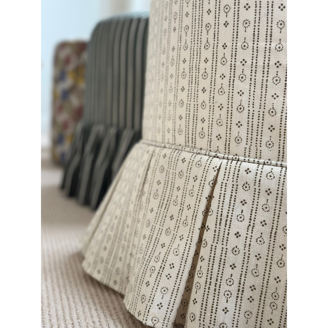 Trendel ottoman with box pleat slipcover