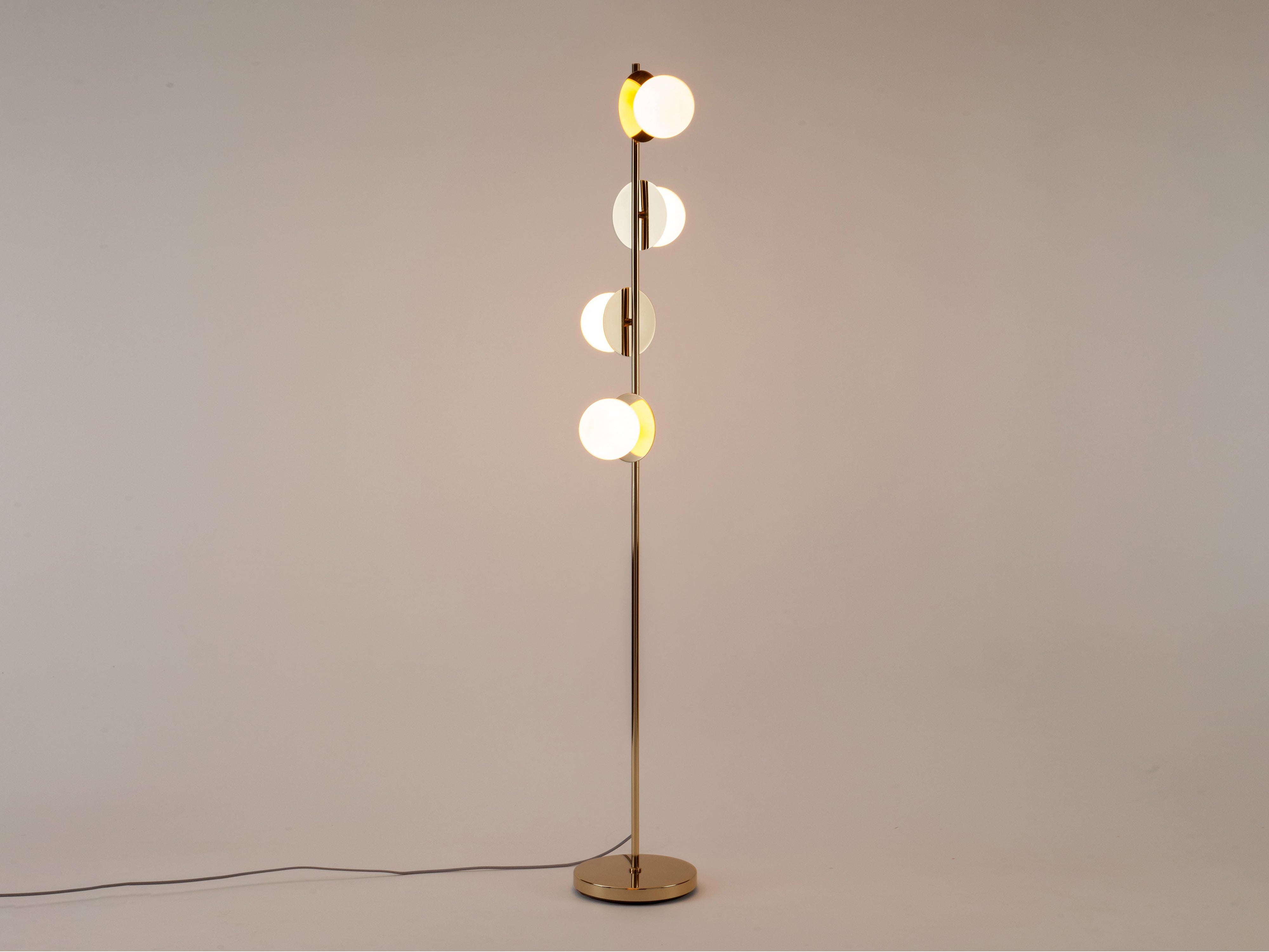 Brass opal disk floor lamp