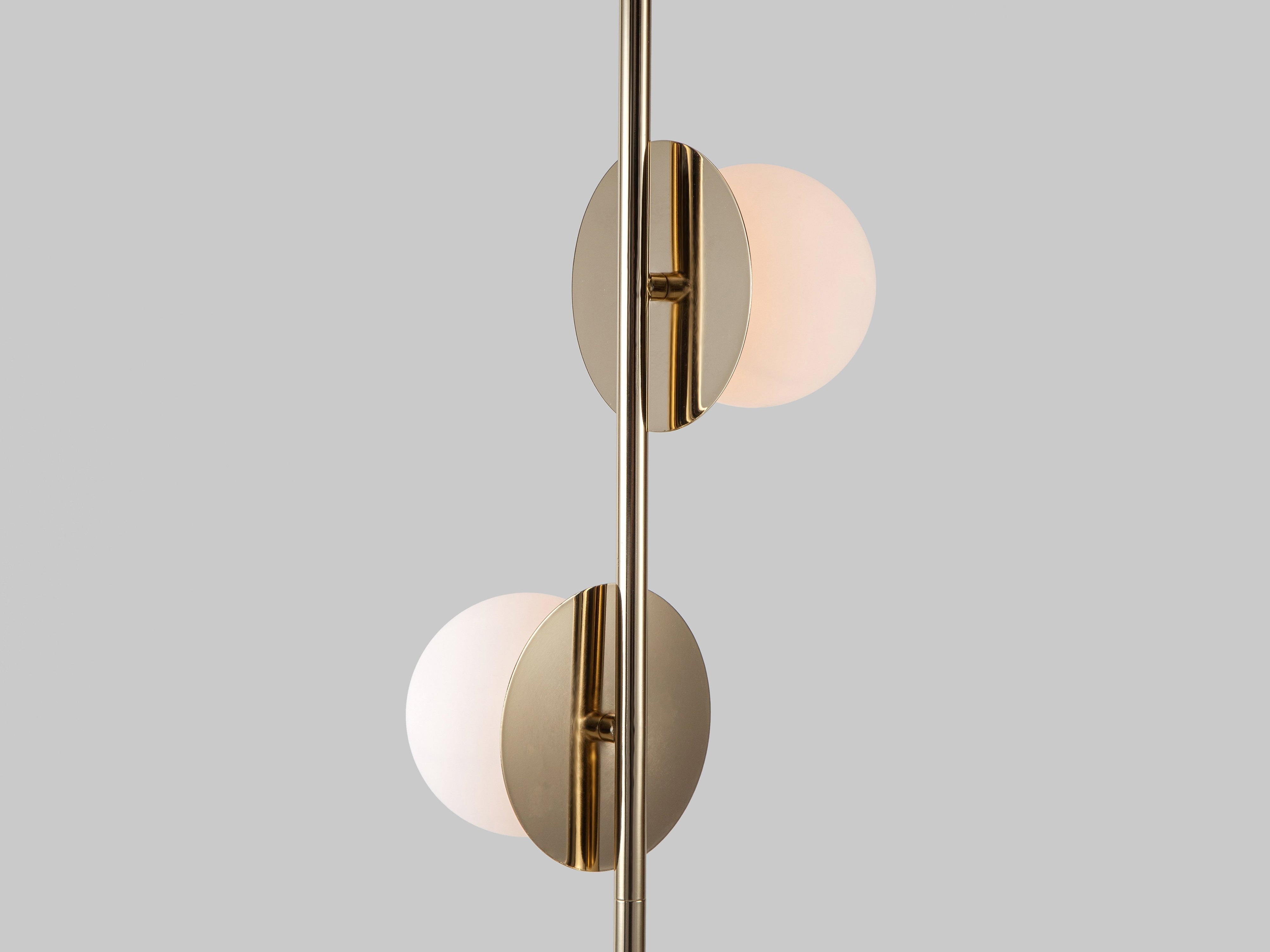 Brass opal disk floor lamp