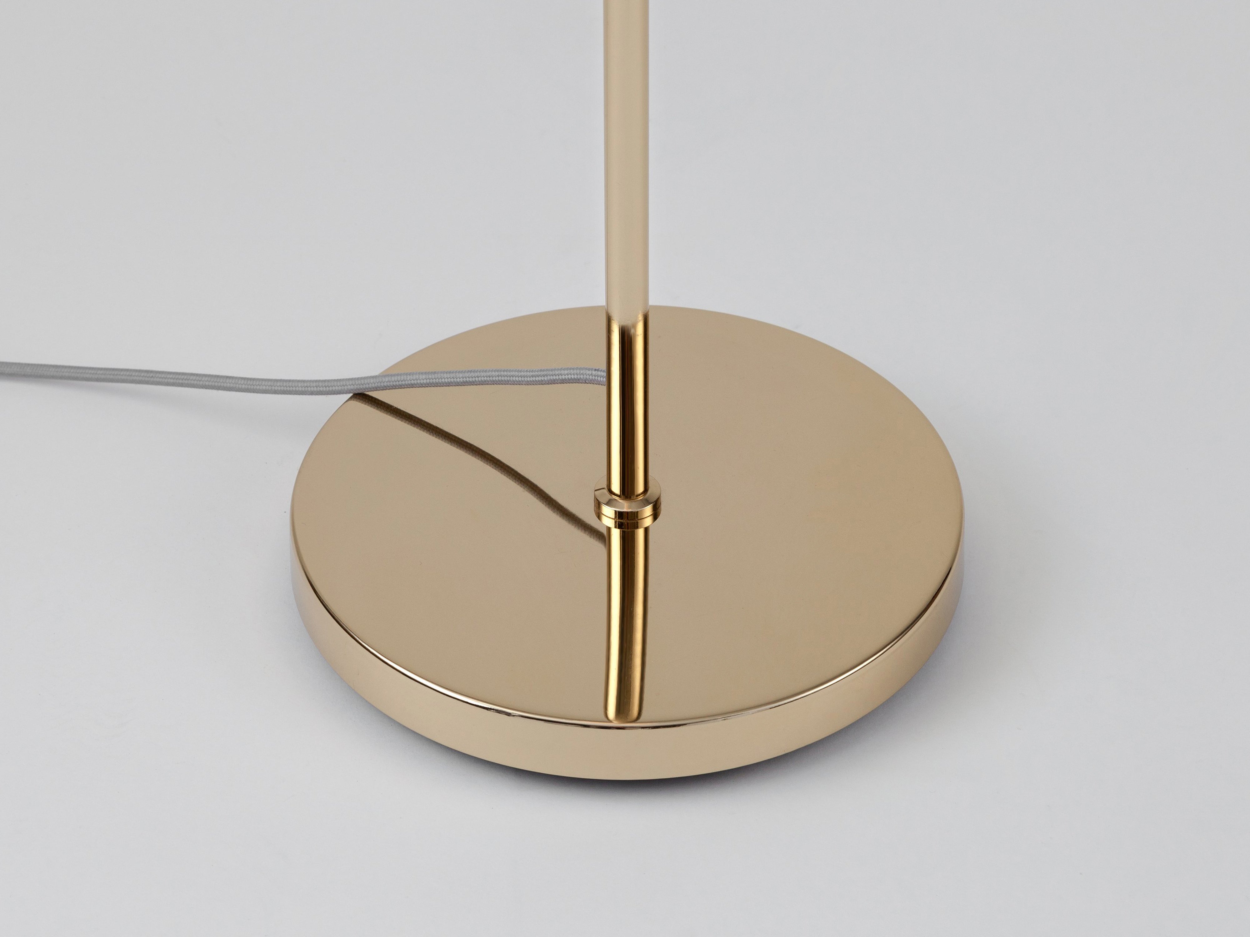 Brass opal disk floor lamp