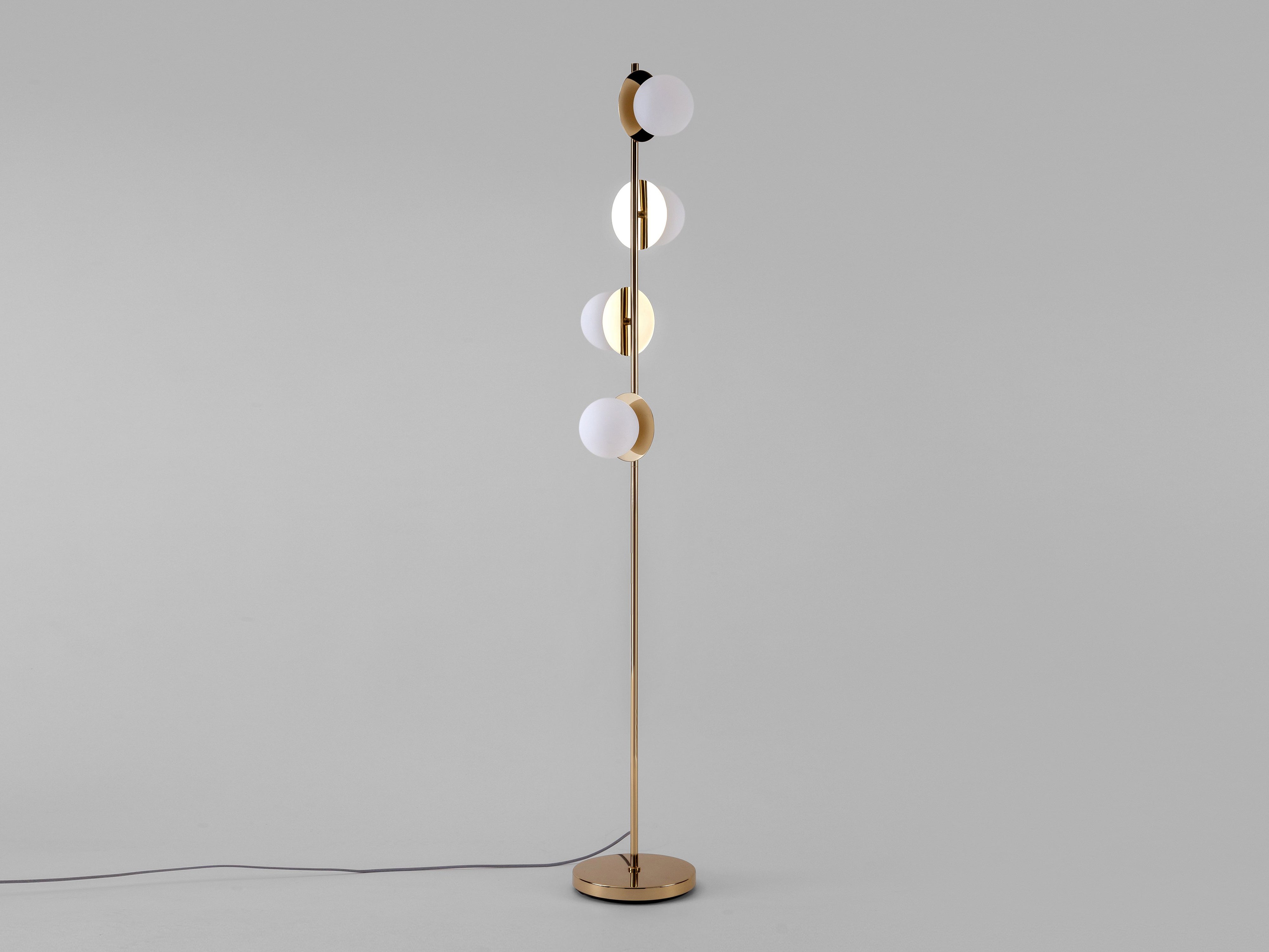 Brass opal disk floor lamp