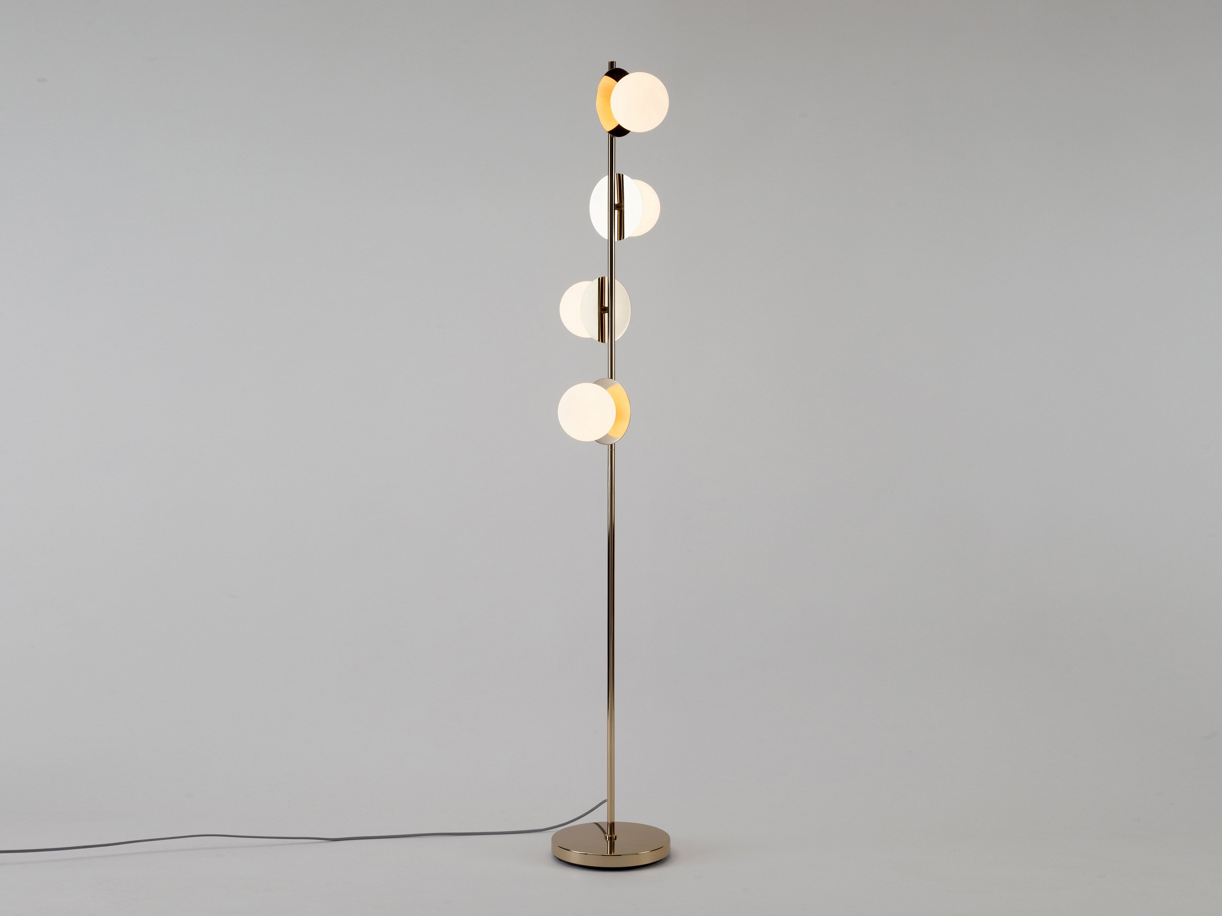 Brass opal disk floor lamp