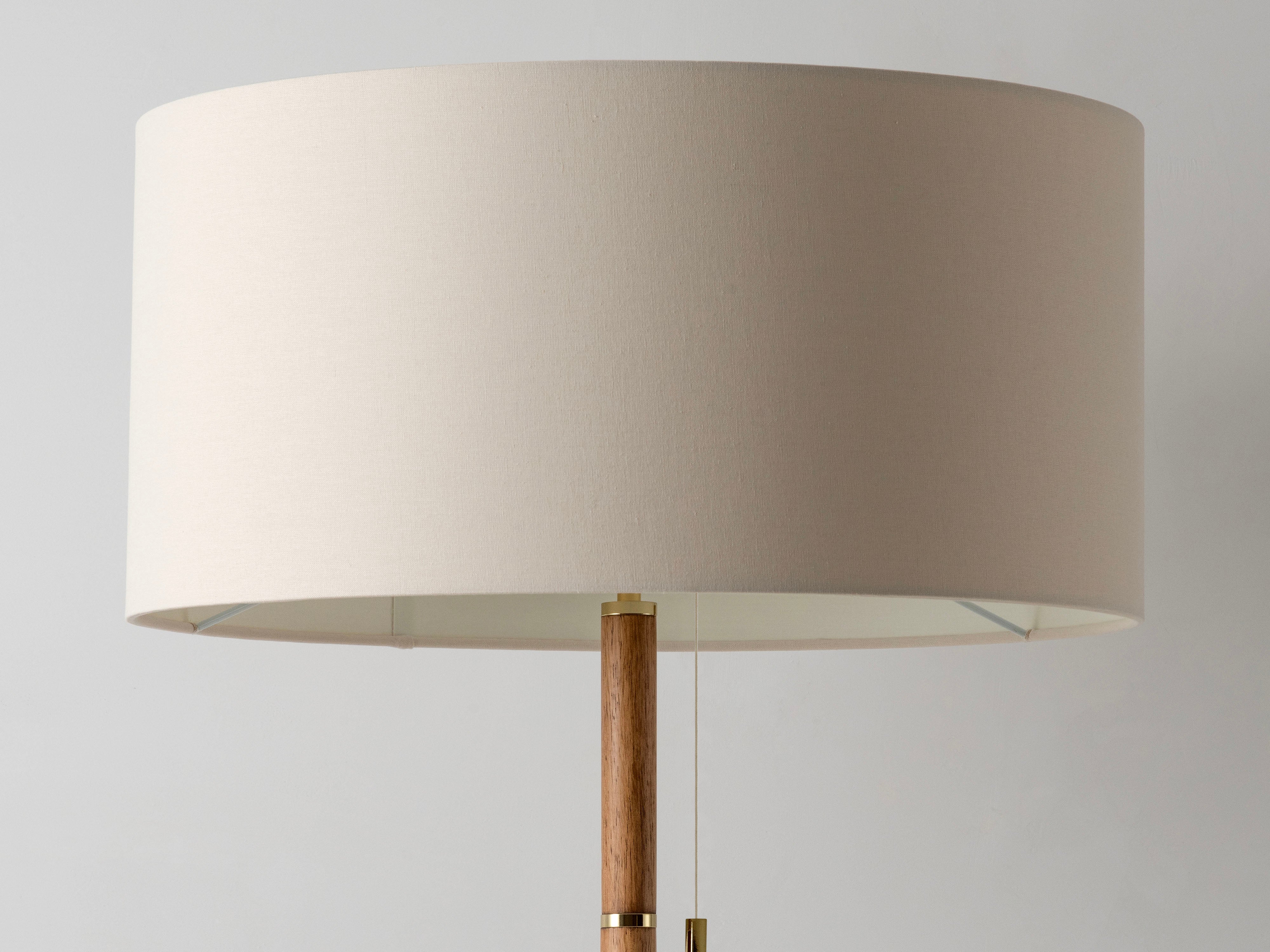 Wooden and brass disk floor lamp