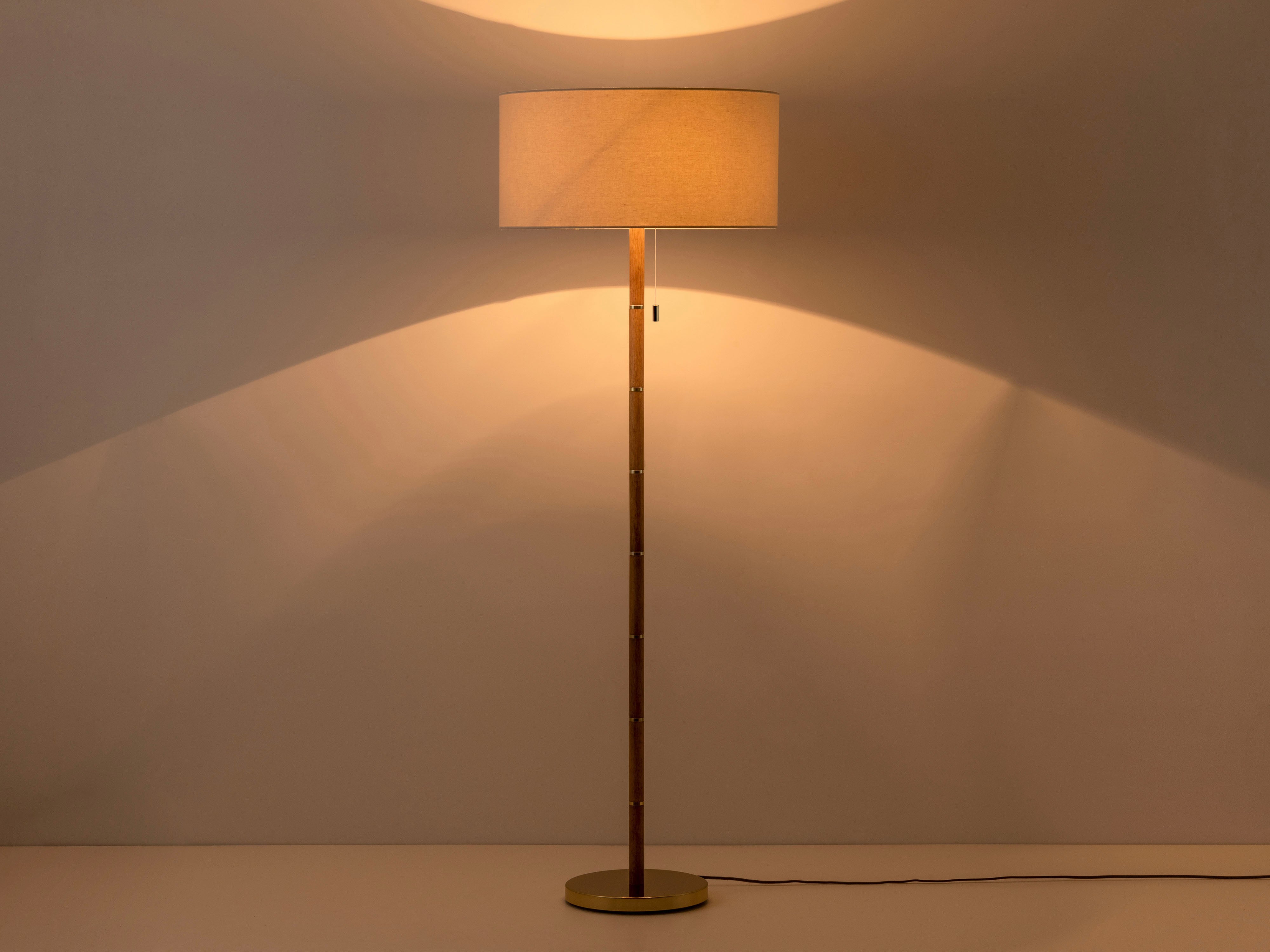 Wooden and brass disk floor lamp