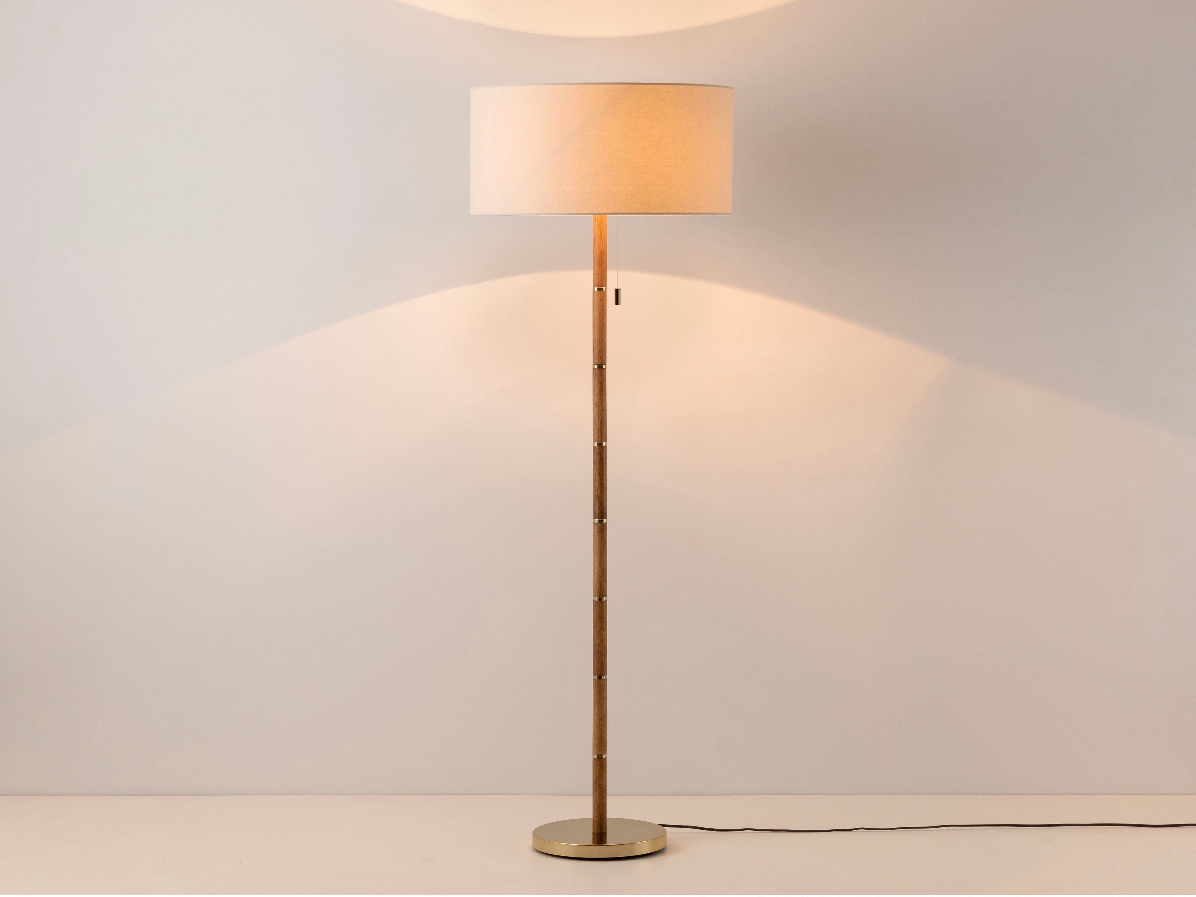 Wooden and brass disk floor lamp