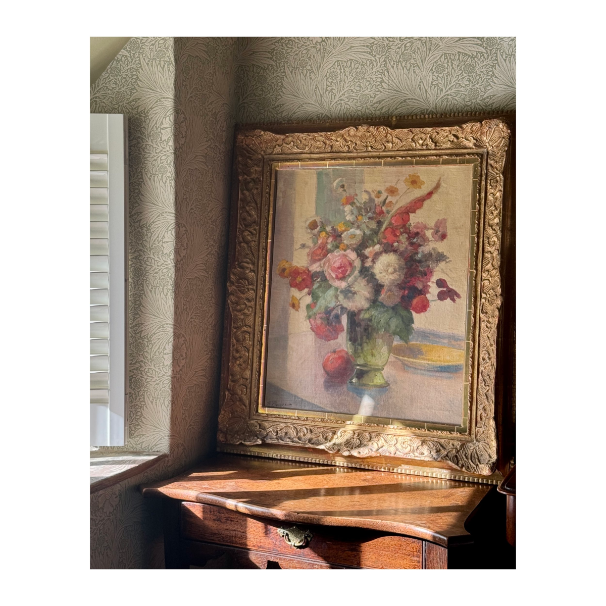 FLOWERS IN A GREEN VASE
