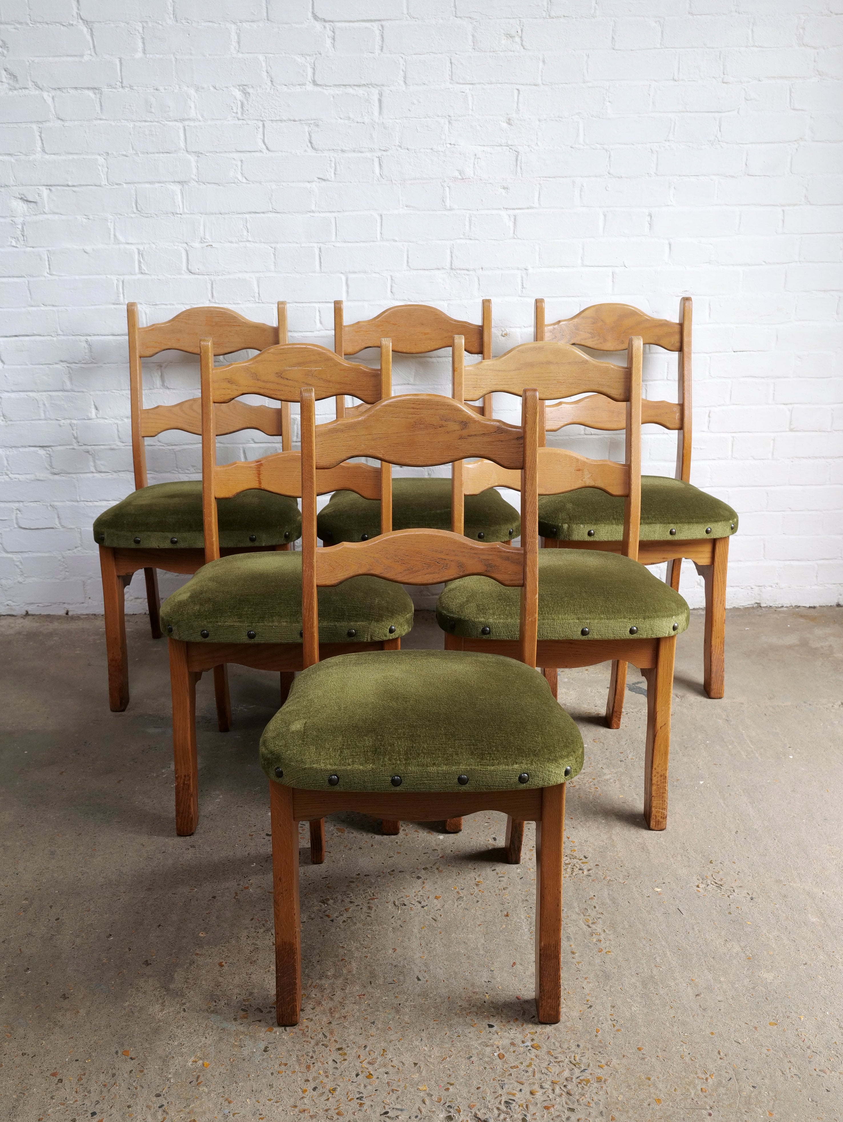 A Set Of 6 Razor Back Oak Chairs