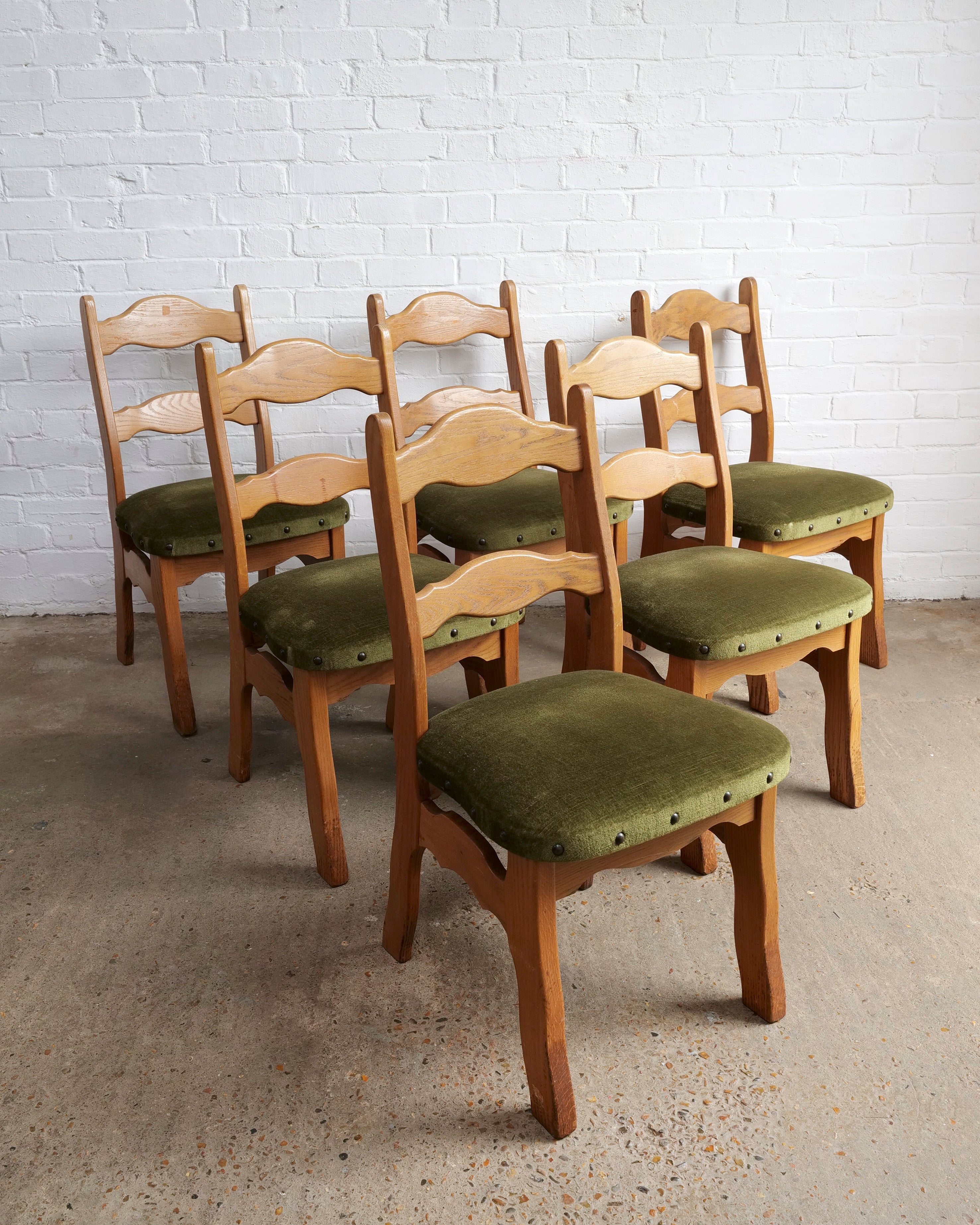 A Set Of 6 Razor Back Oak Chairs