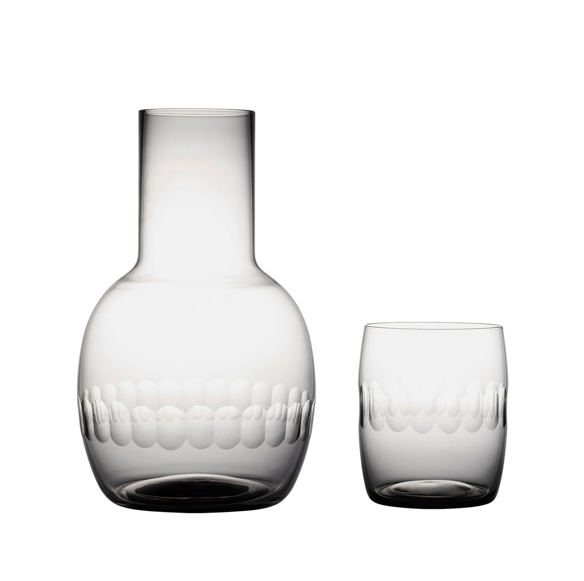 A smoky crystal carafe set with lens design