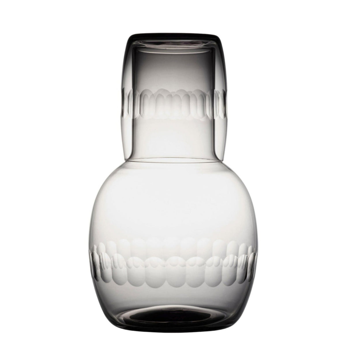 A smoky crystal carafe set with lens design